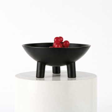 Three-legged fruit bowl